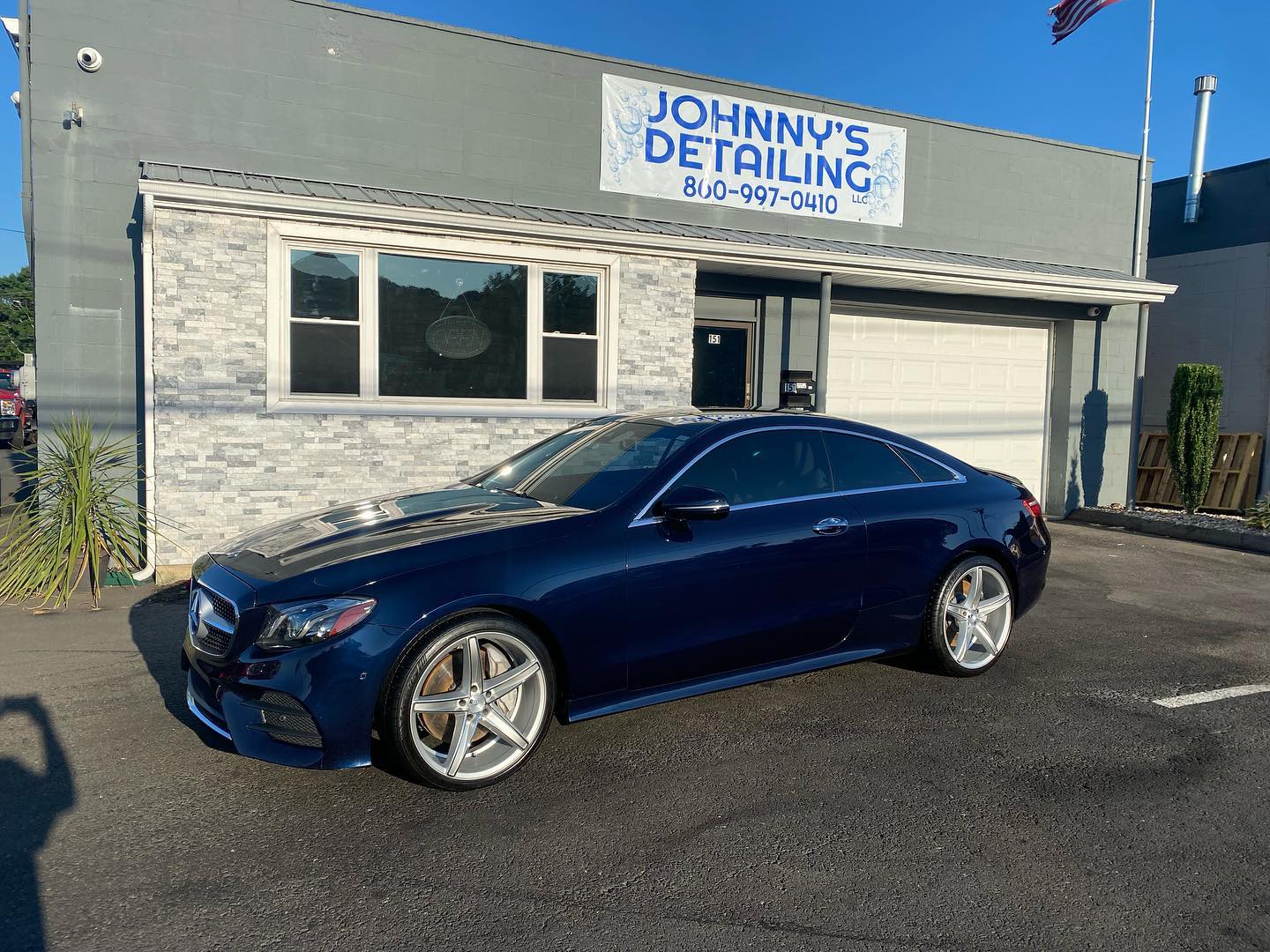 Dark blue Mercedes-Benz E-class coupe detailed